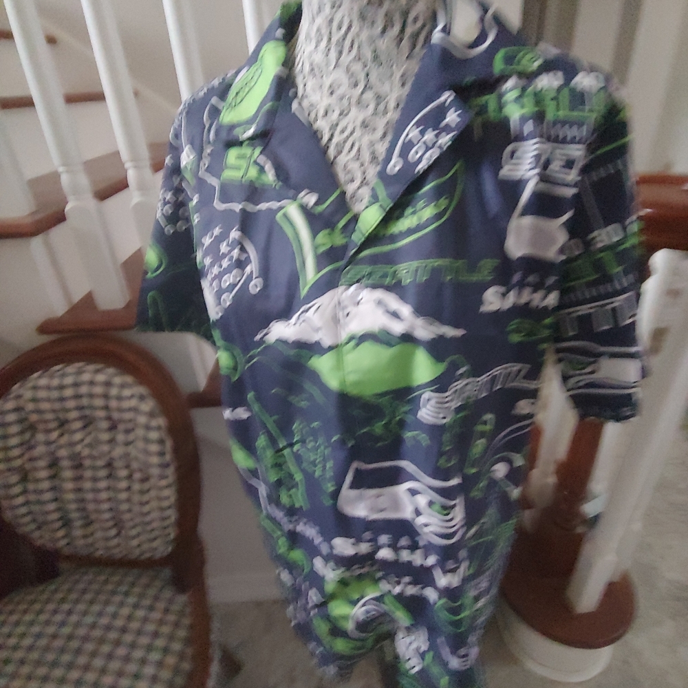 The product is a Seattle Seahawks short sleeve button up shirt